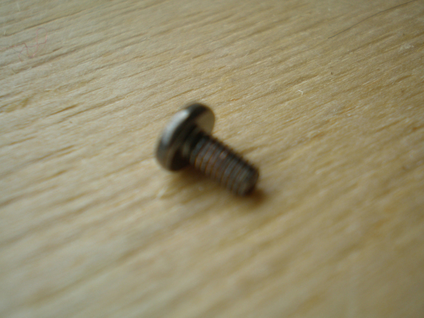 Tascam TSR8 side panel screw small 7.7mm long 6mm wide cross head screw